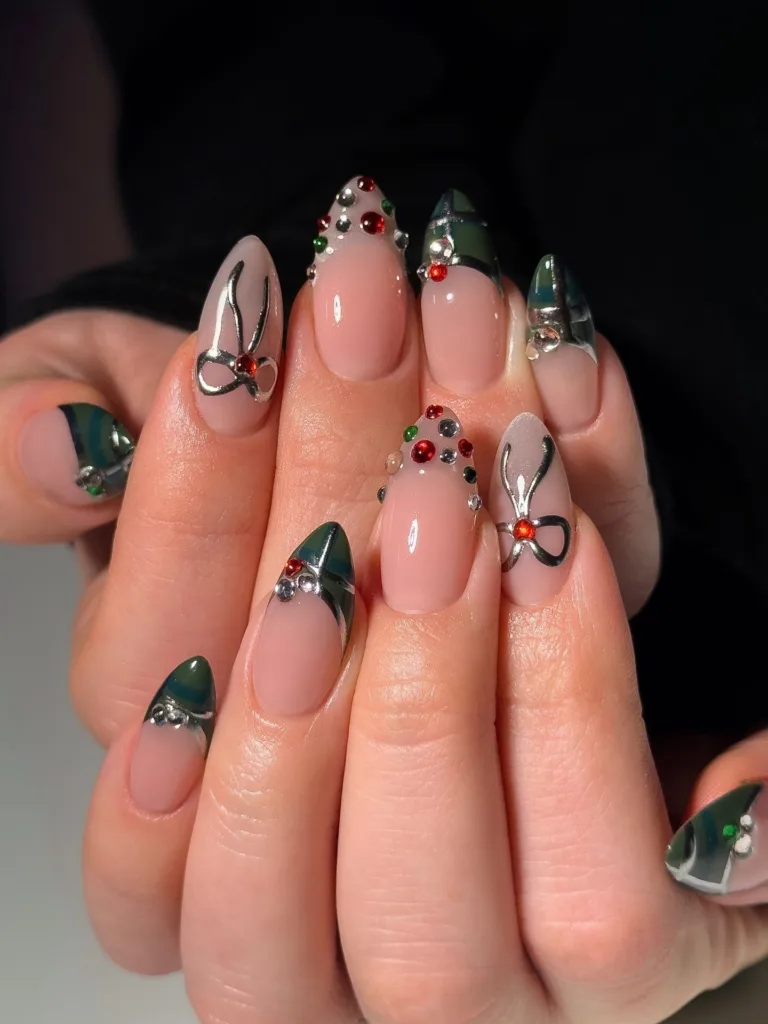 glam green christmas nails with rhinestones silver bows and festive tip designs