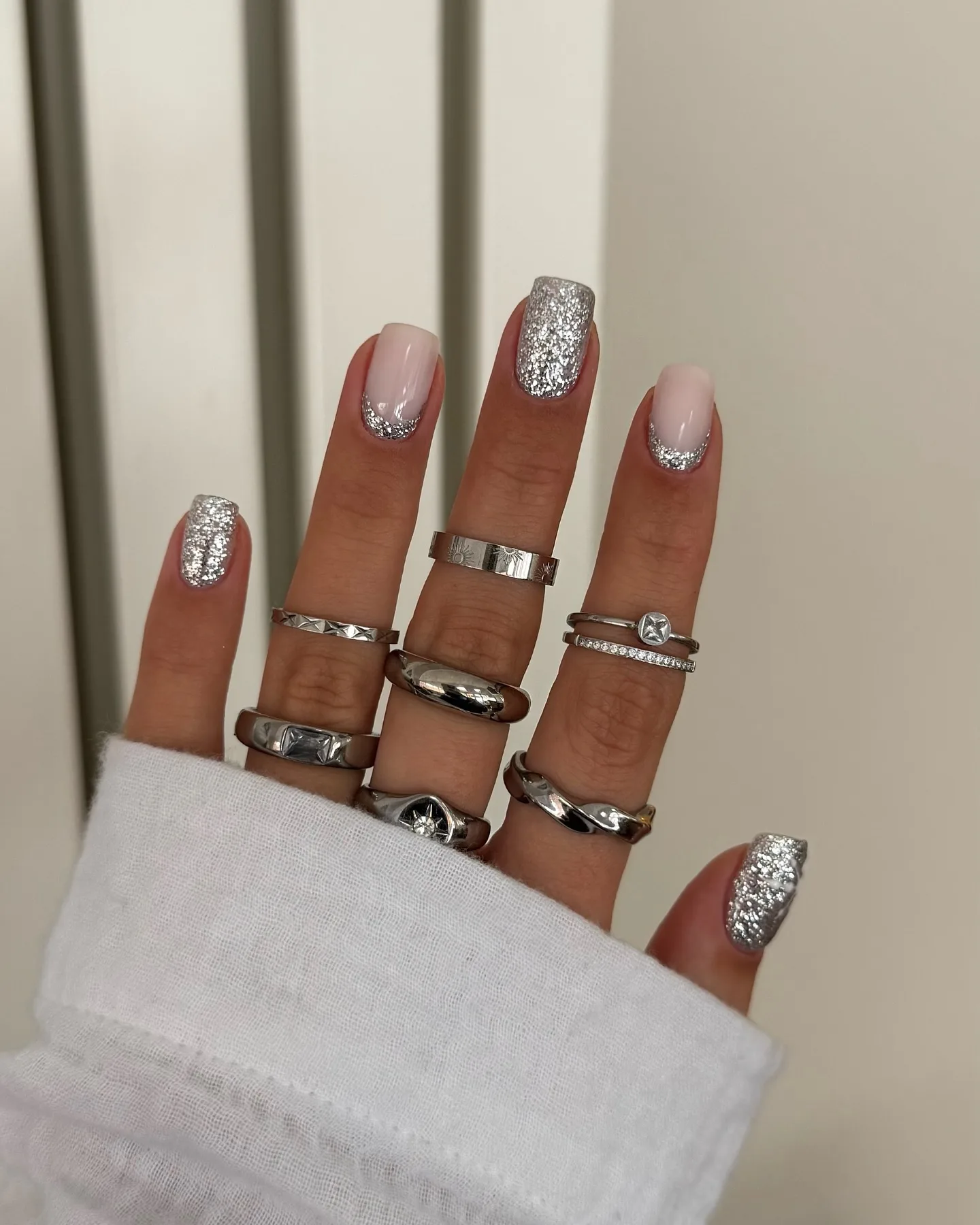 nude pink almond silver glitter nails
