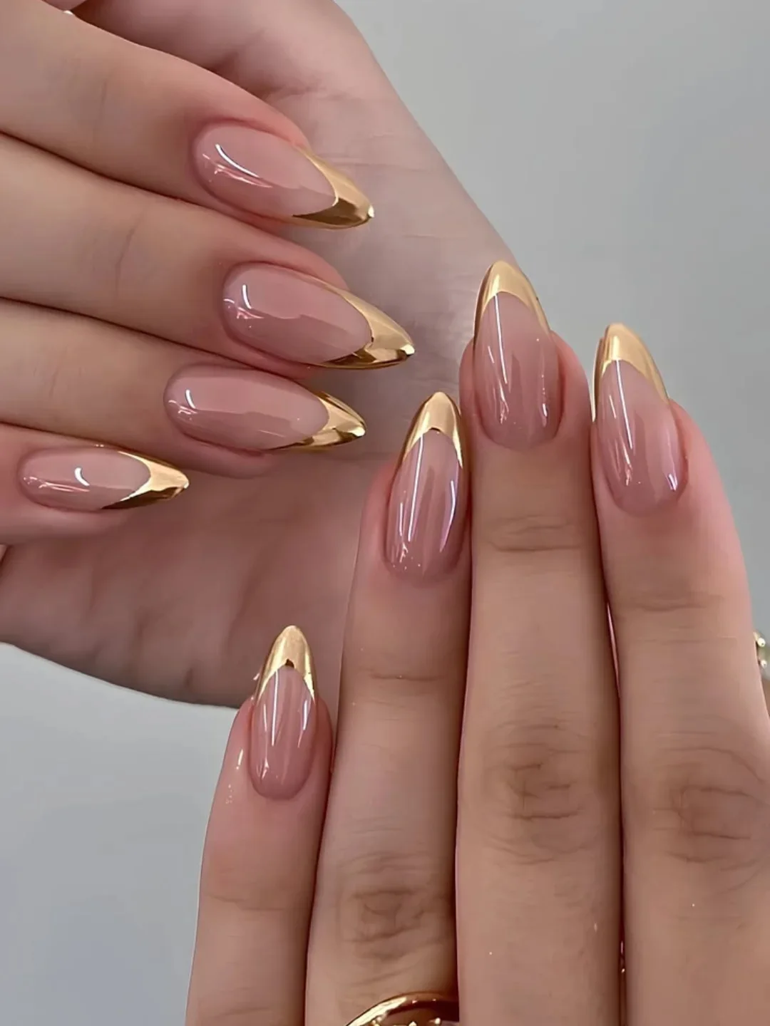nude pink almond gold chrome nails