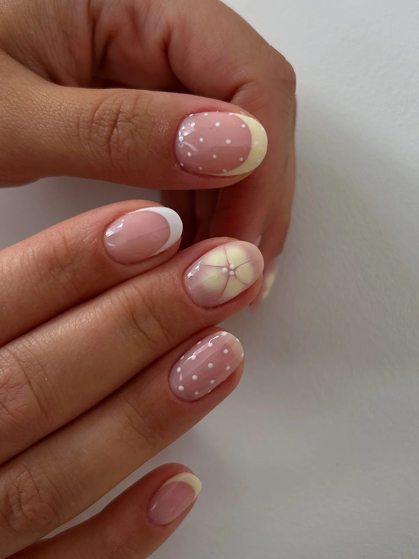 nude pink oval french daisy nails