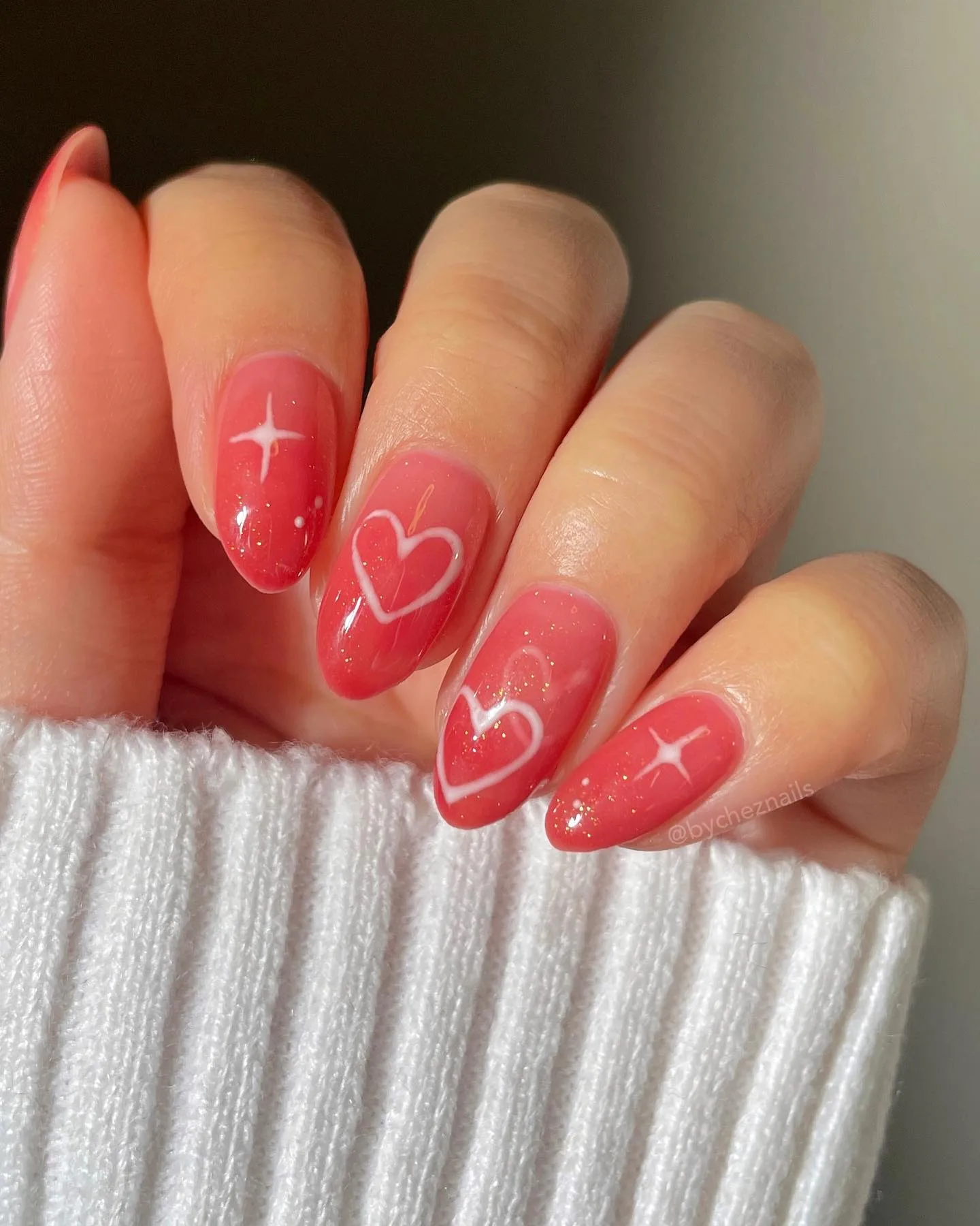 coral pink oval heart star nails