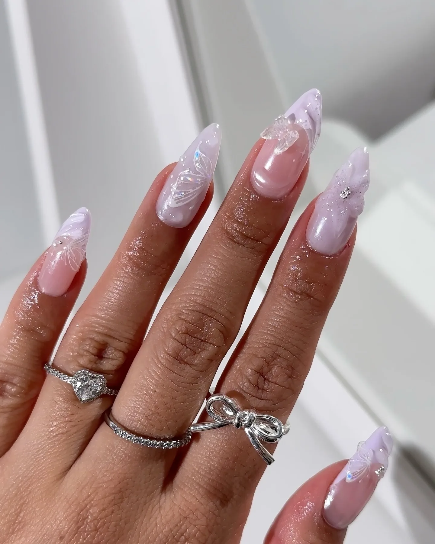 lavender almond butterfly design nails