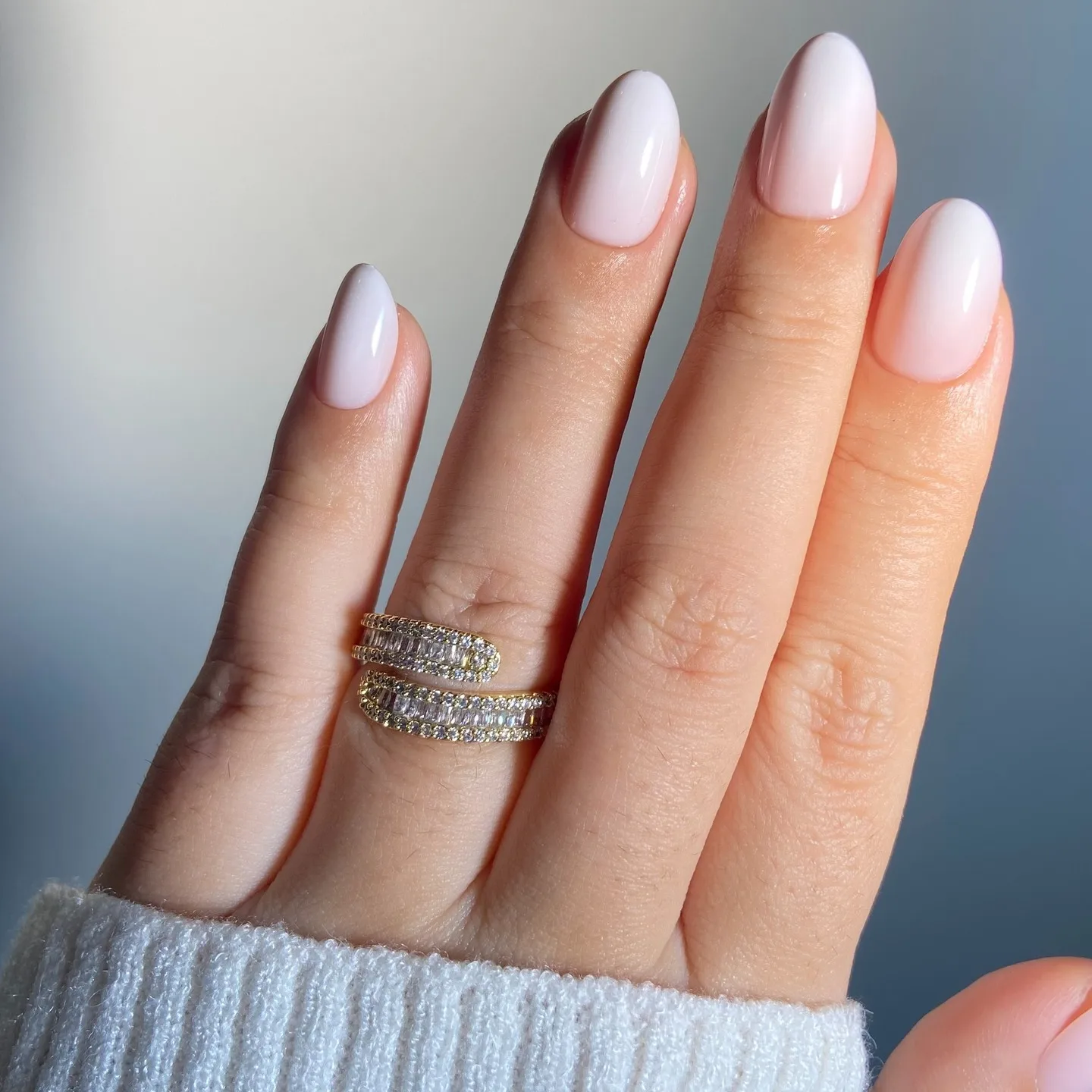 milky pink oval glossy nails