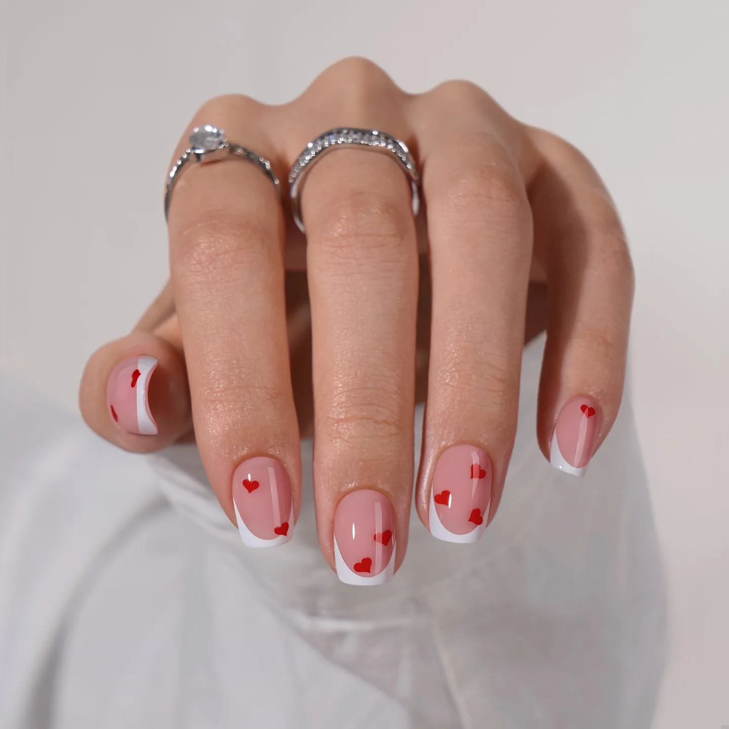 pink oval french heart nails