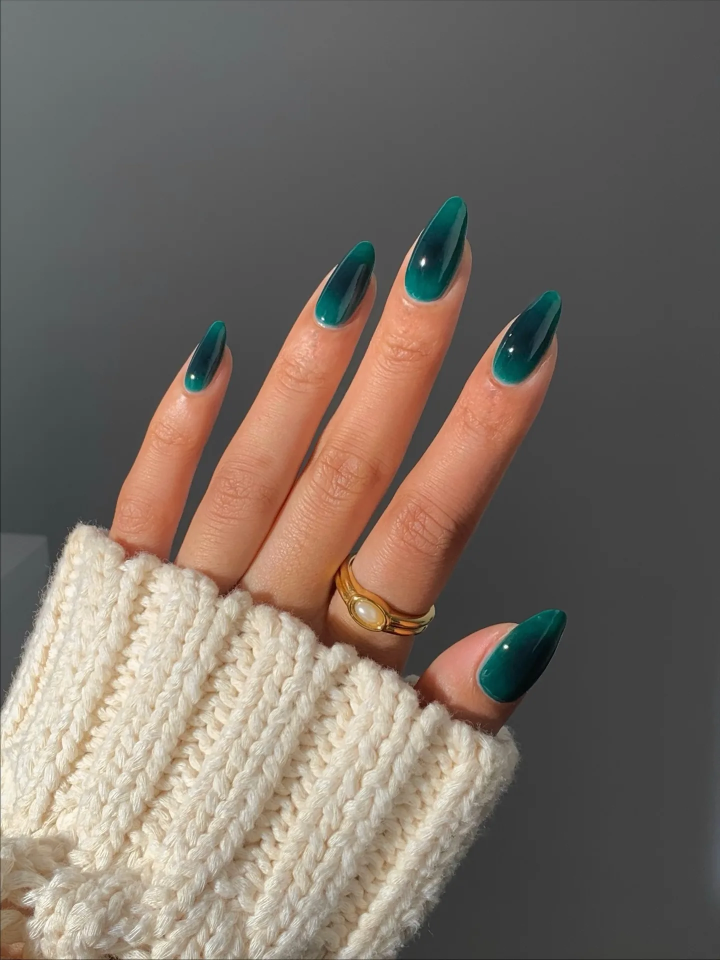 emerald green almond glossy nails