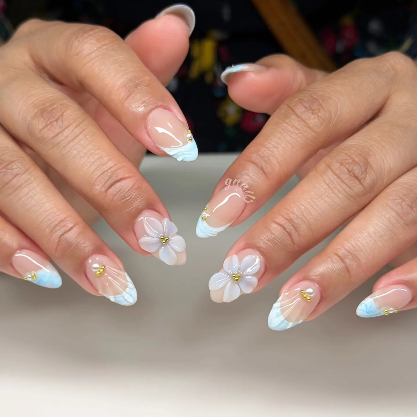 peachy nude almond floral gradient nails