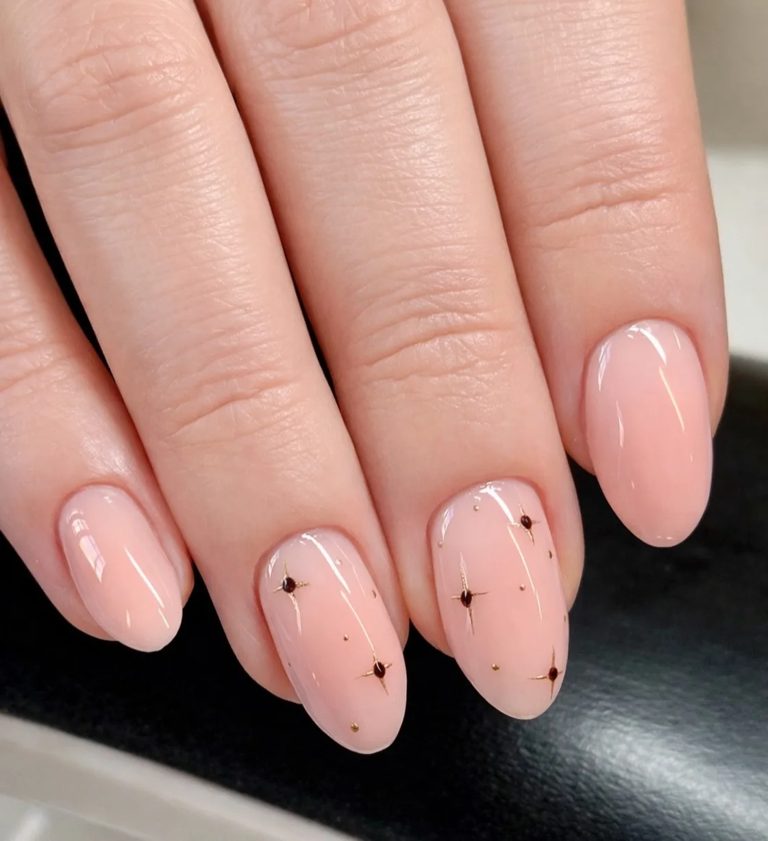 peachy pink almond studded nails