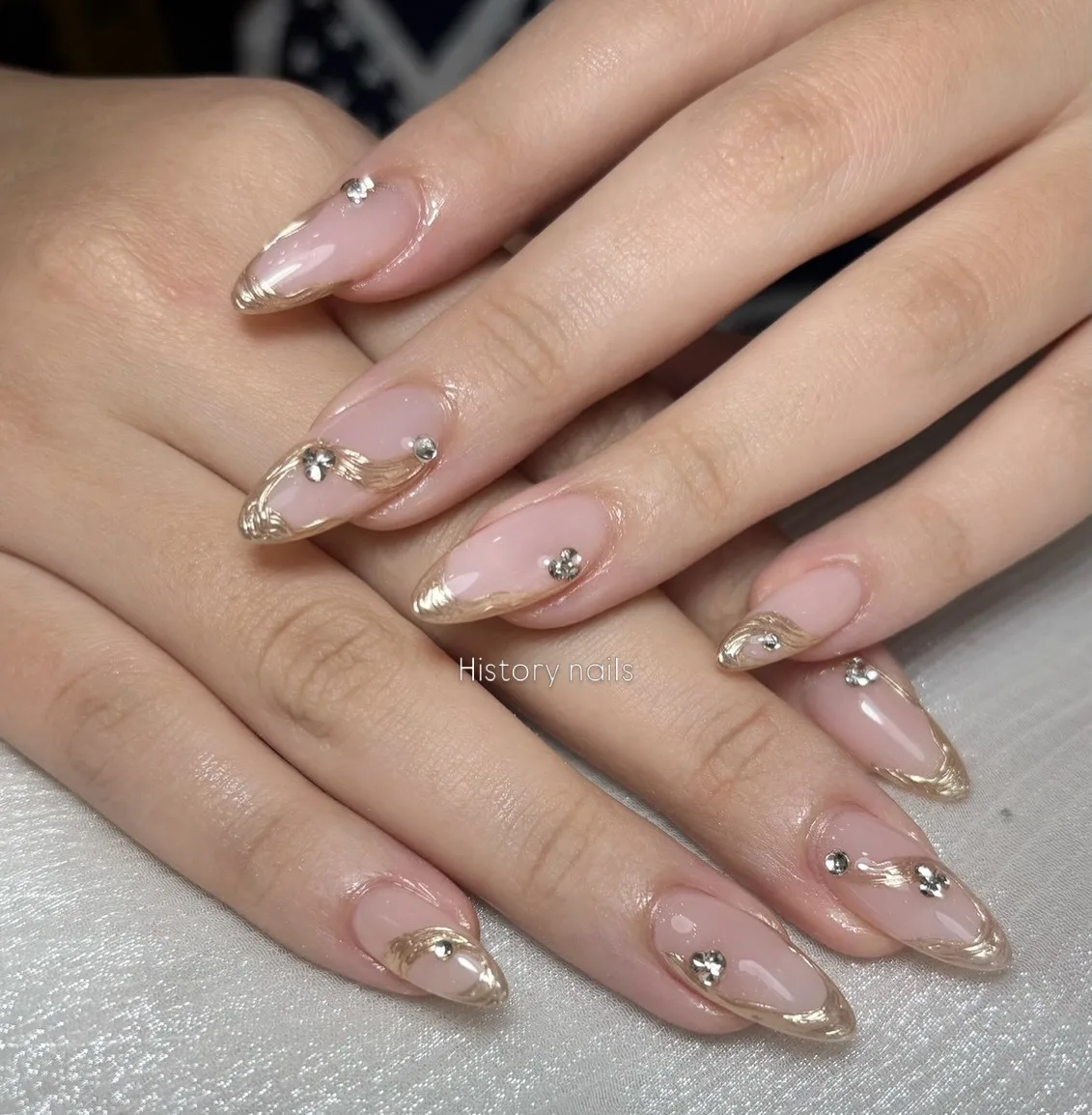 nude pink almond chrome accent nails
