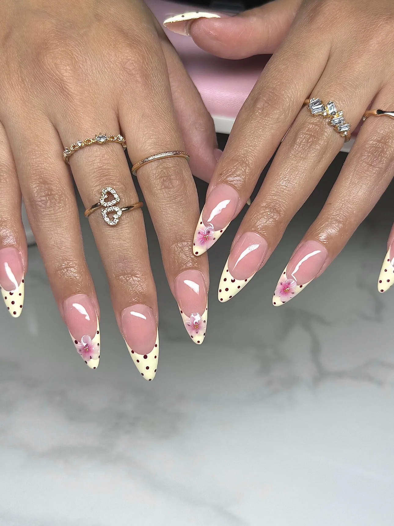 nude pink stiletto floral tip nails