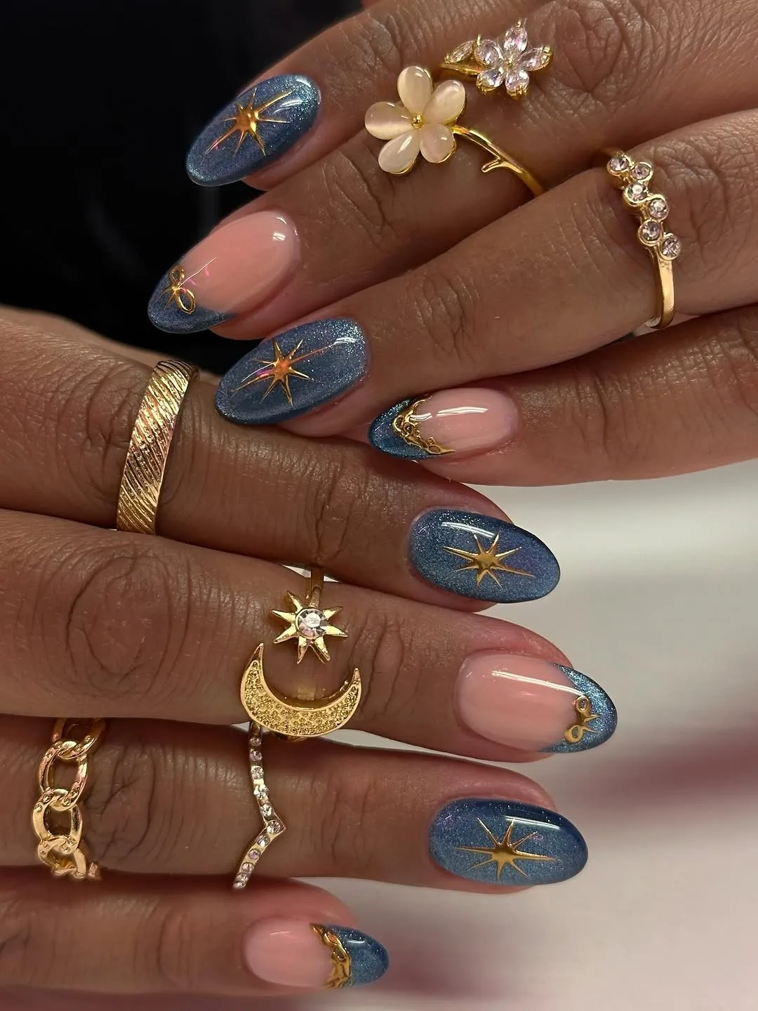 blue shimmer oval celestial star nails