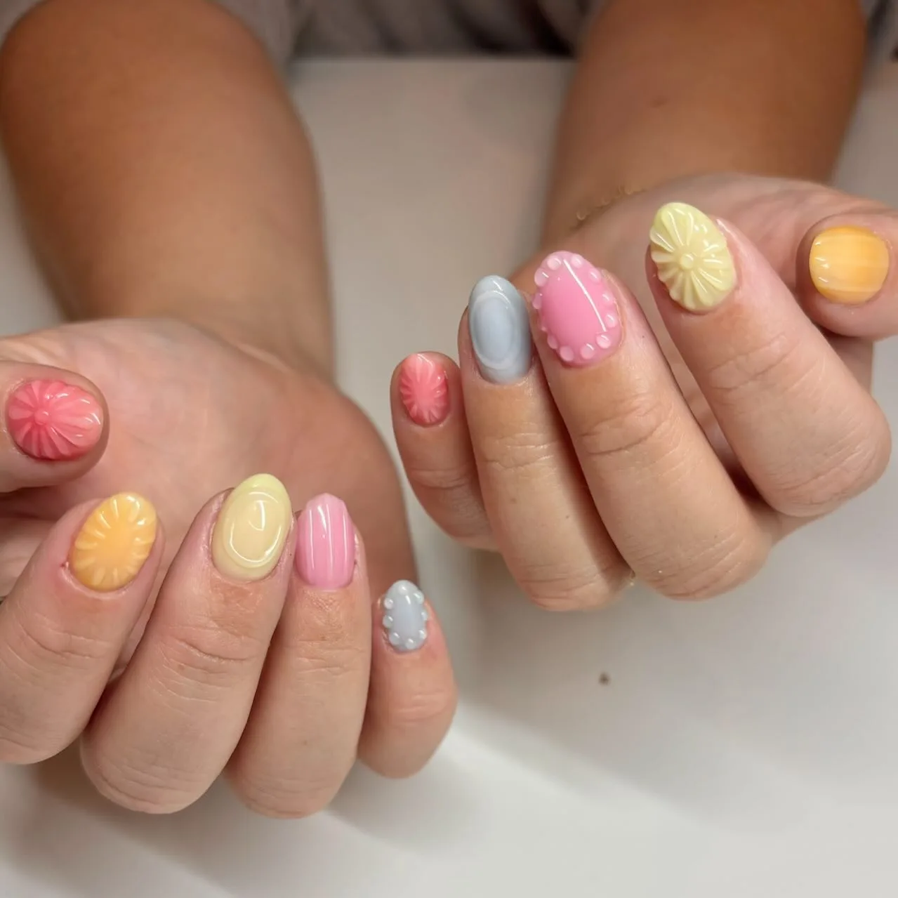pastel rainbow oval floral nails