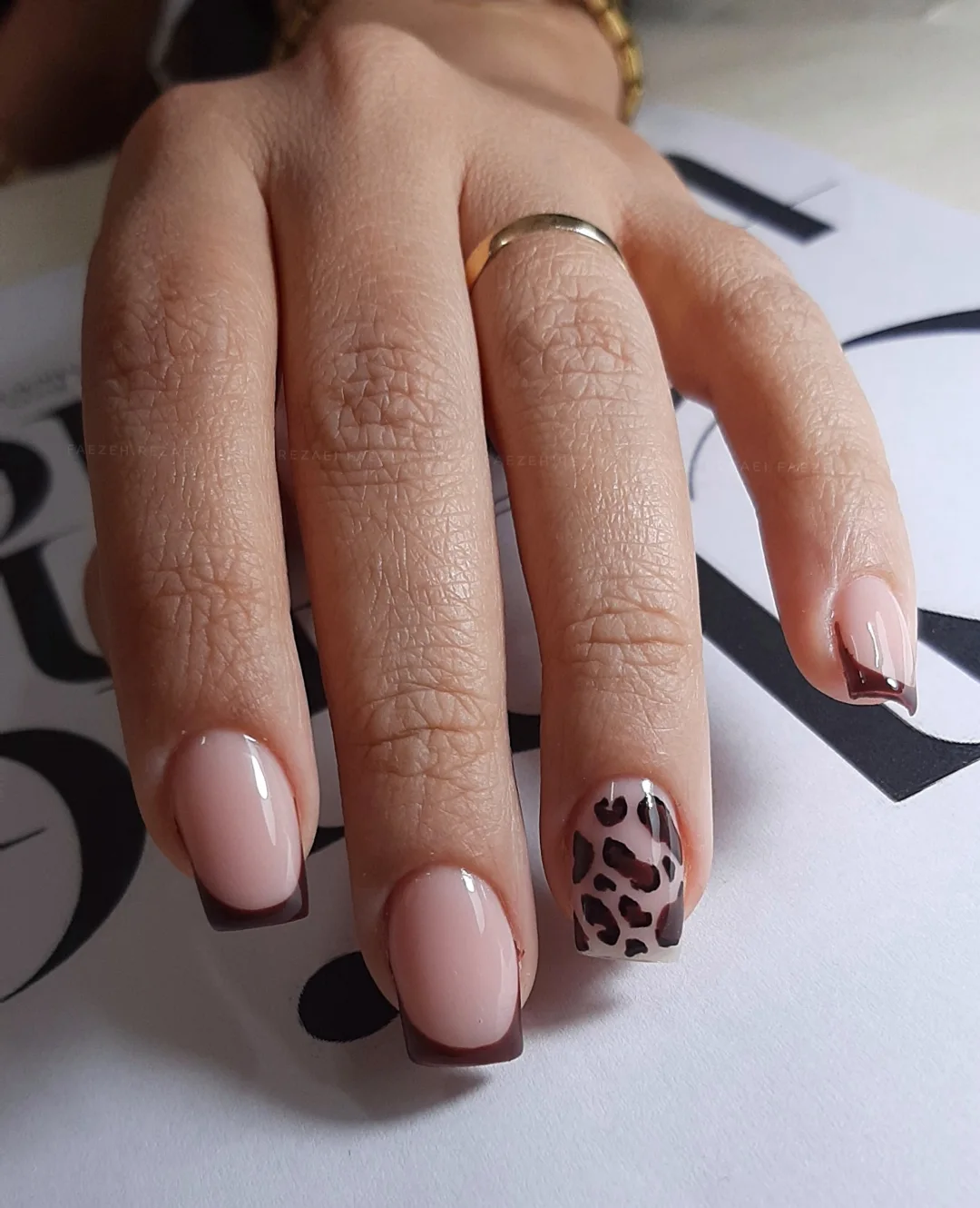 pink oval leopard accent nails