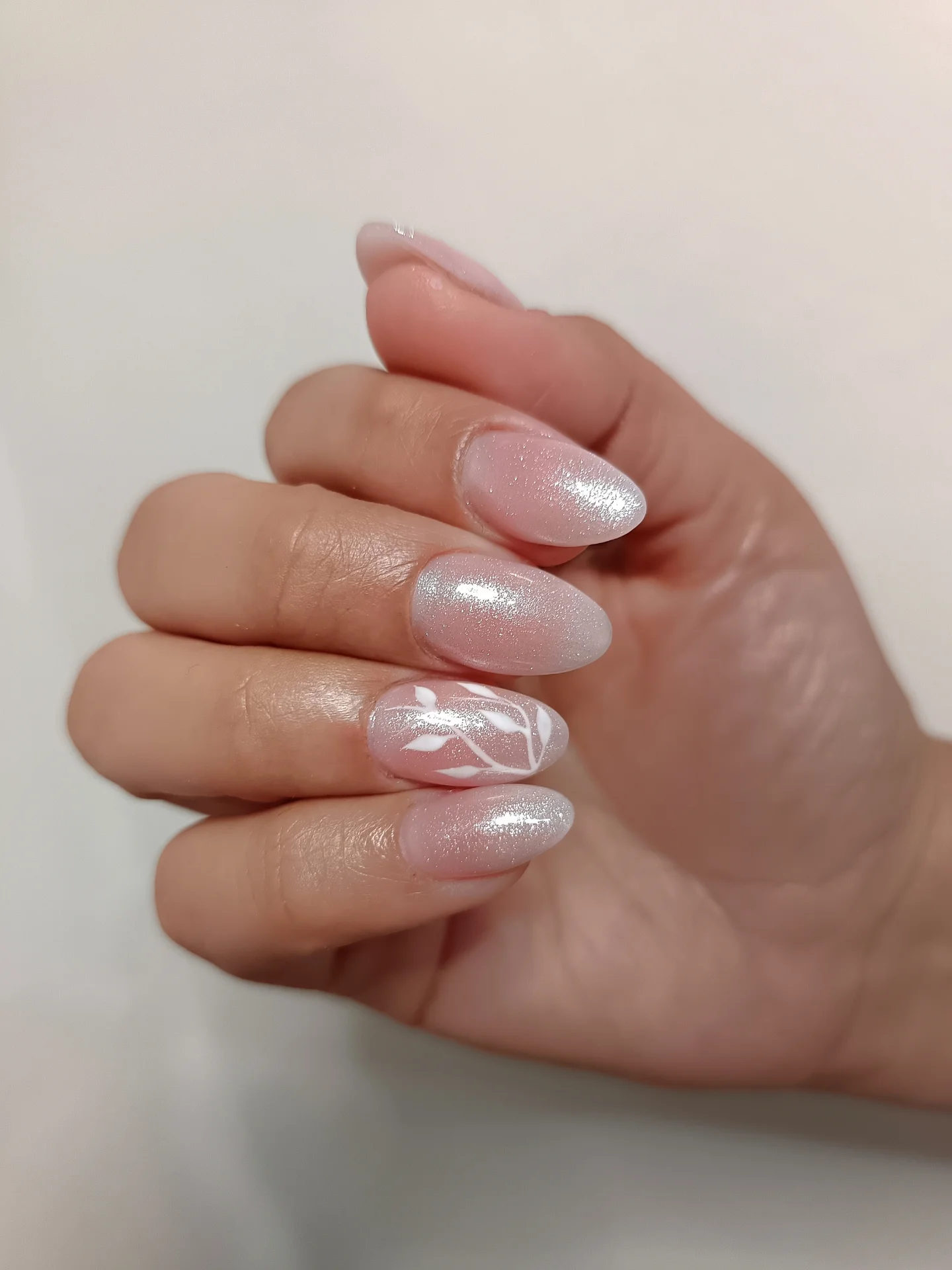 pink almond shimmer accent nails