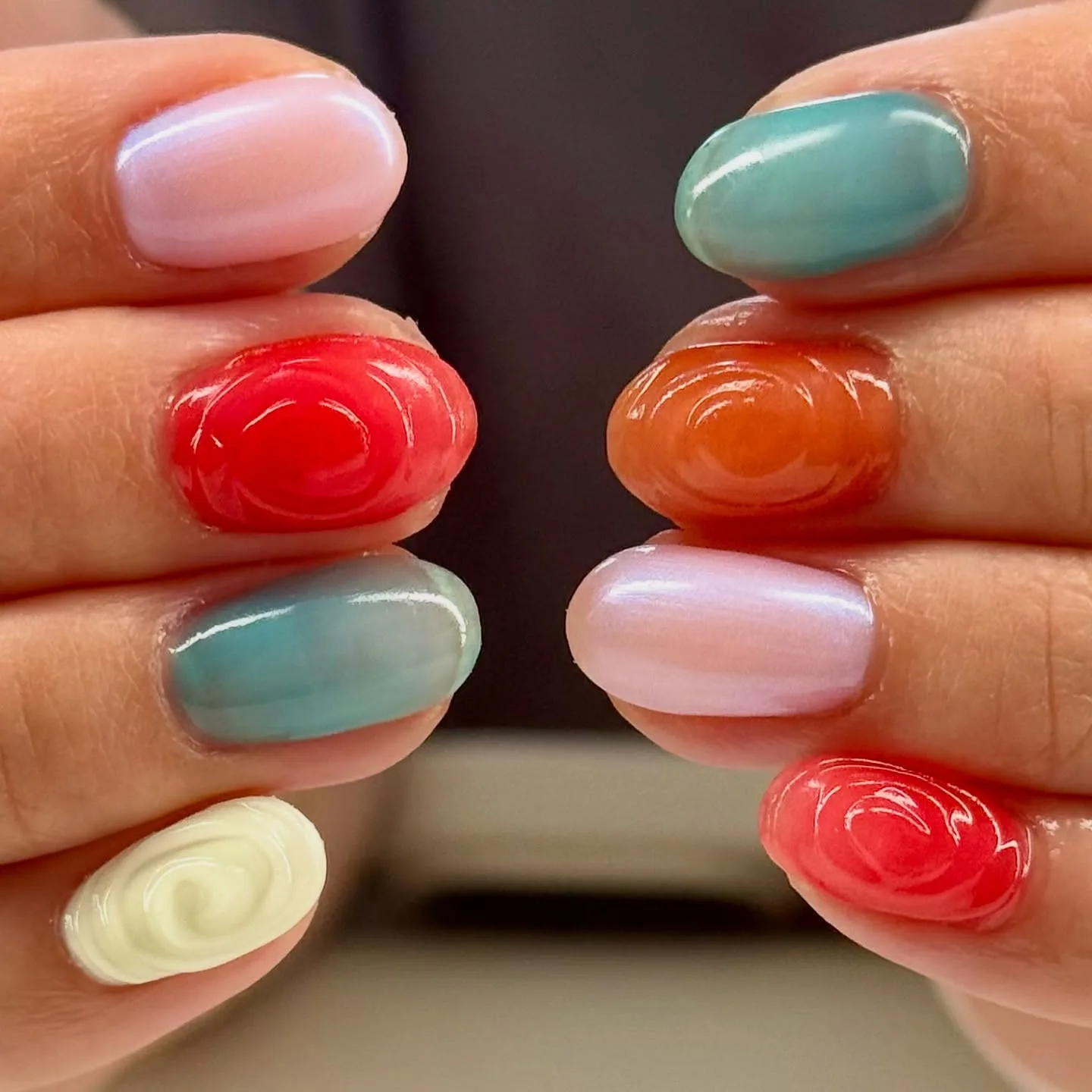 multicolor oval swirl marble nails