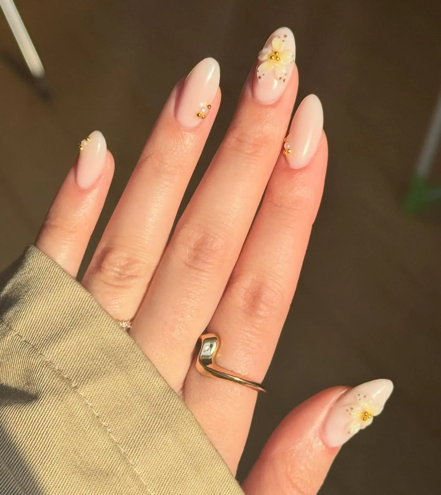 milky white almond beaded nails