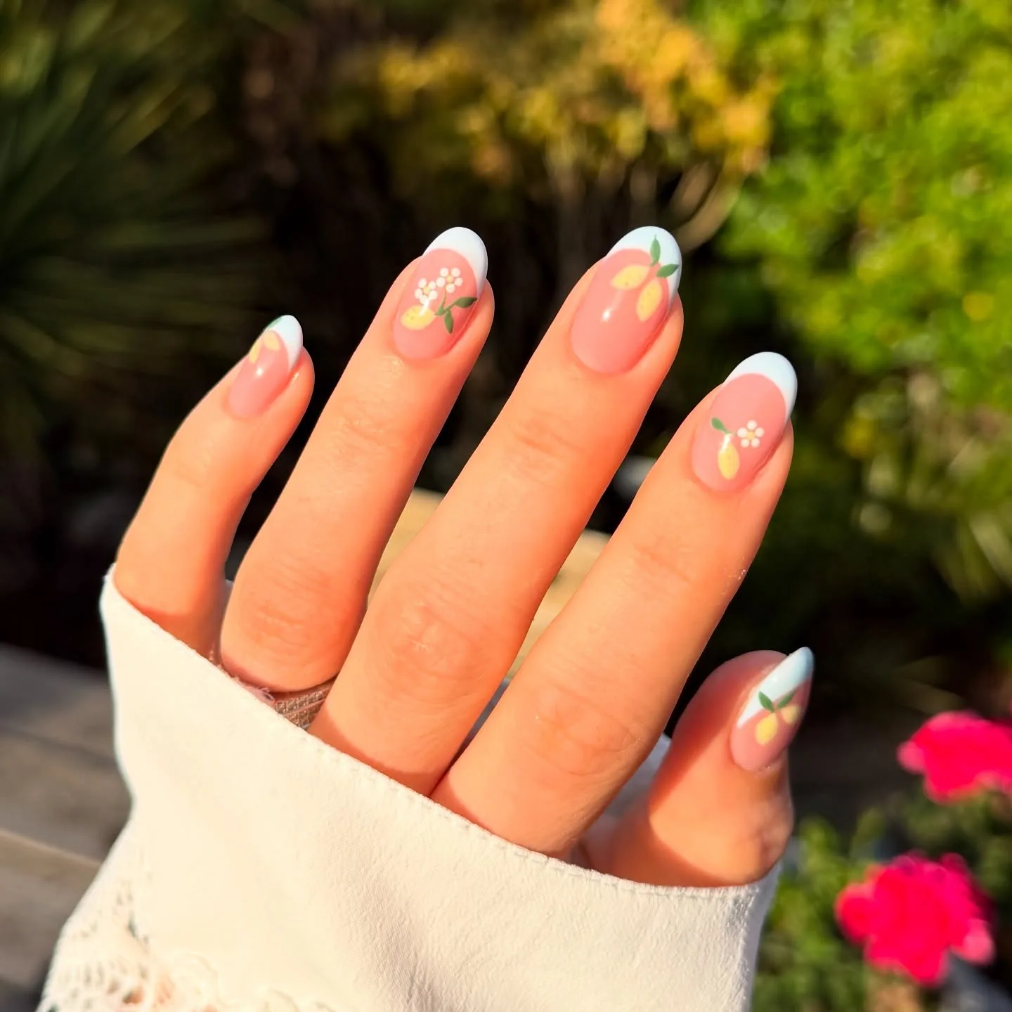 peachy pink oval fruit design nails