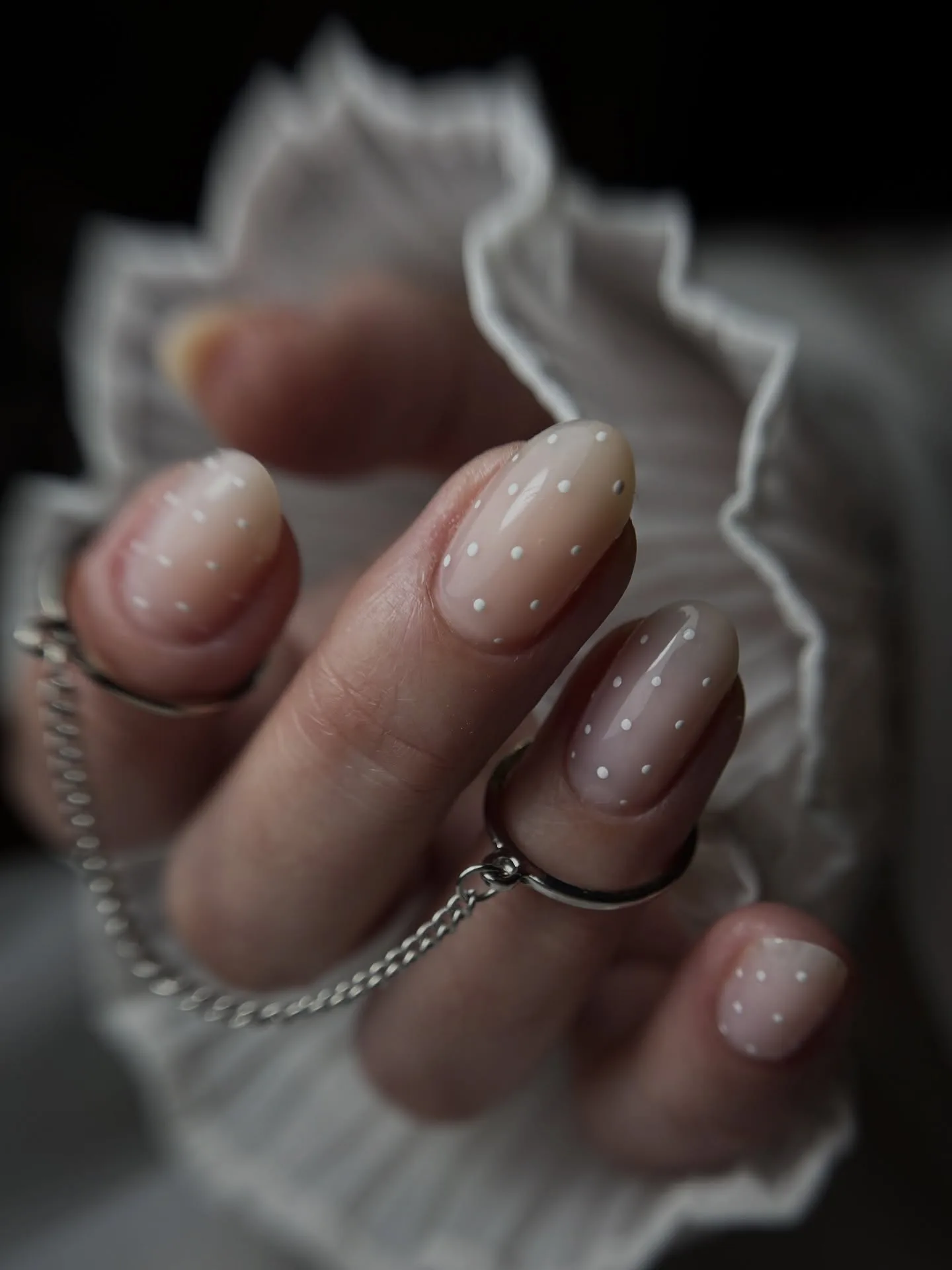 nude pink almond polka dot nails