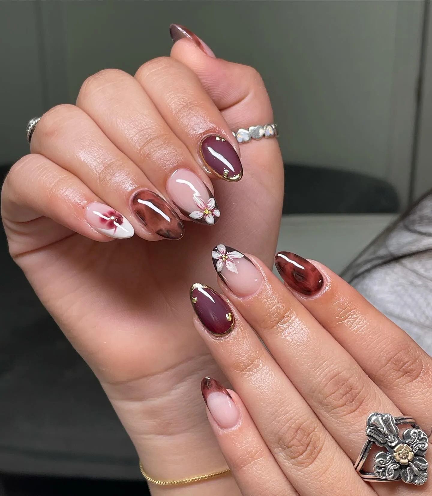 burgundy chrome almond floral nails