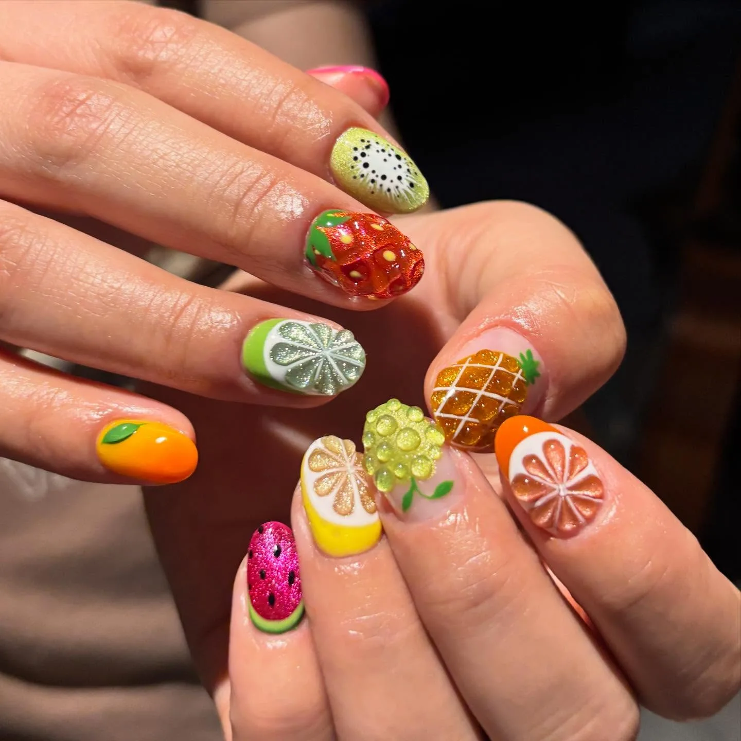 multicolored oval fruit design nails