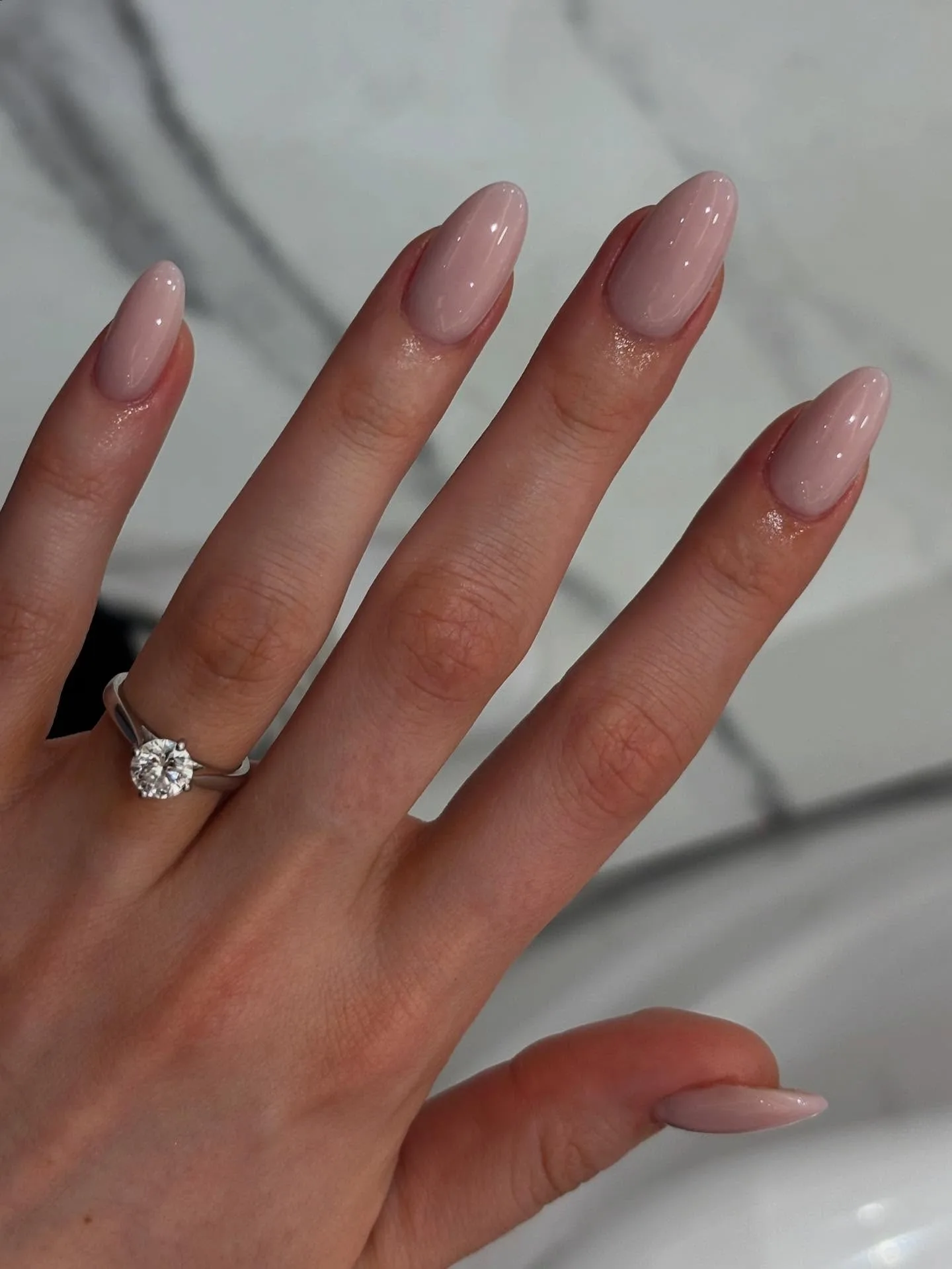 pink nude almond glossy nails