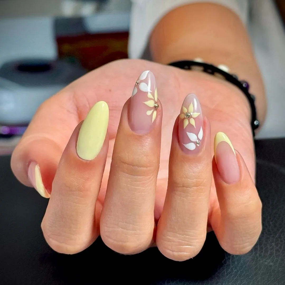 yellow almond floral design nails