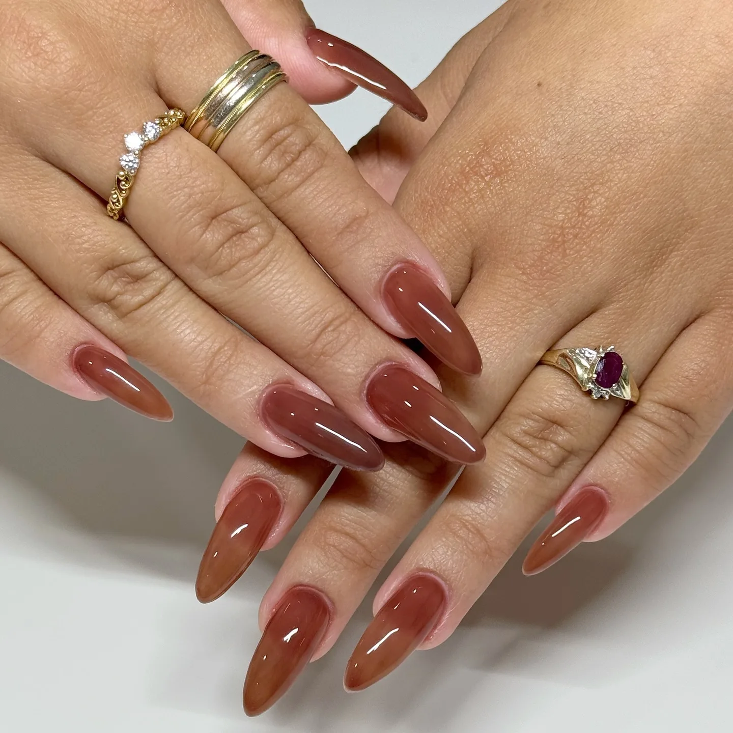 terracotta brown almond glossy nails