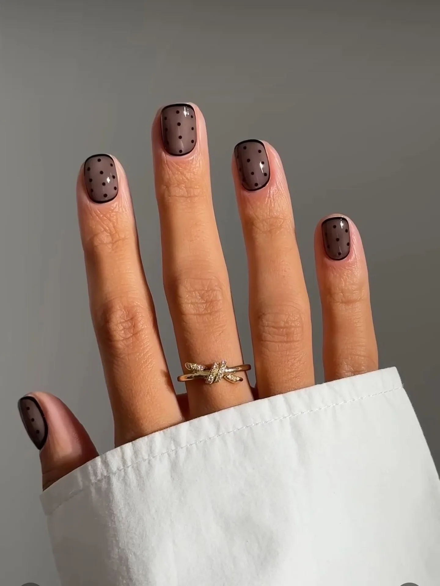 chocolate brown oval polka dot nails