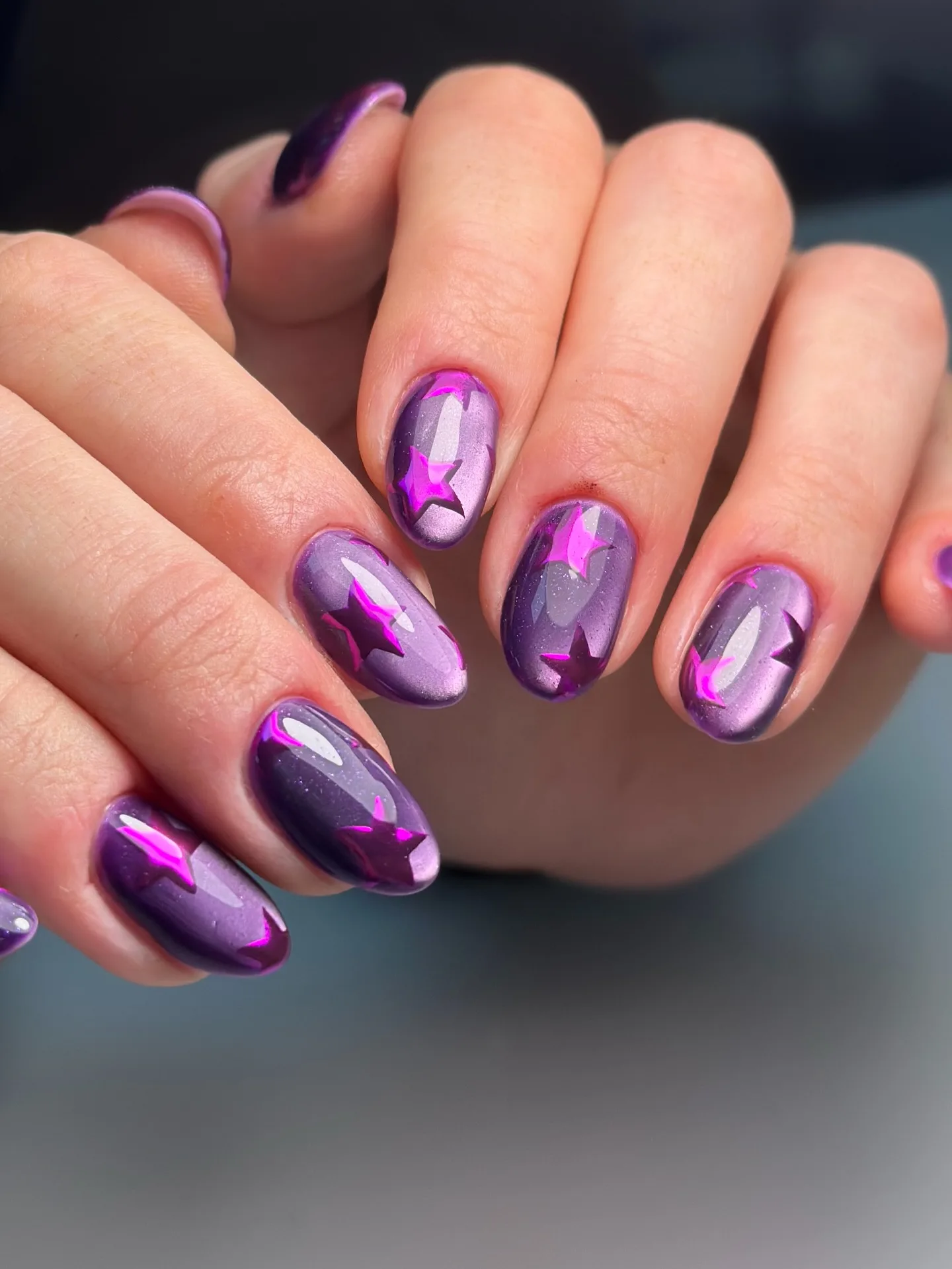purple oval lightning bolt nails