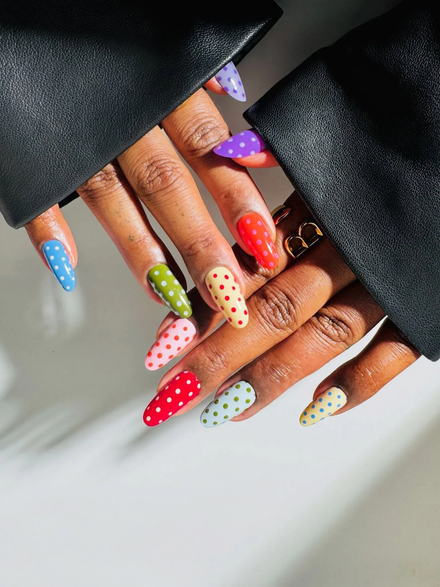 multicolor almond polka dot nails