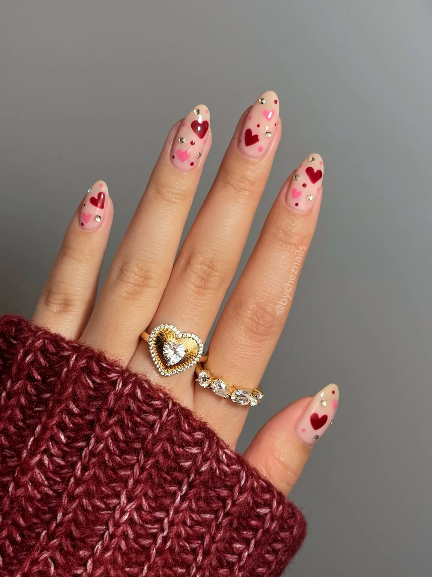 pink almond hearts rhinestone nails