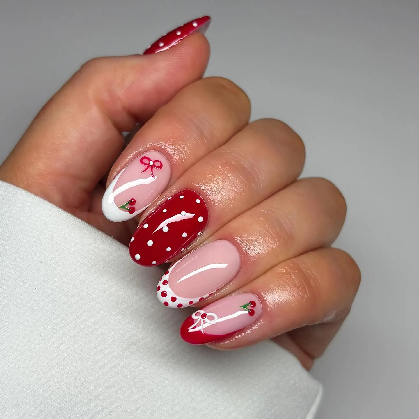 red pink almond cherry nails