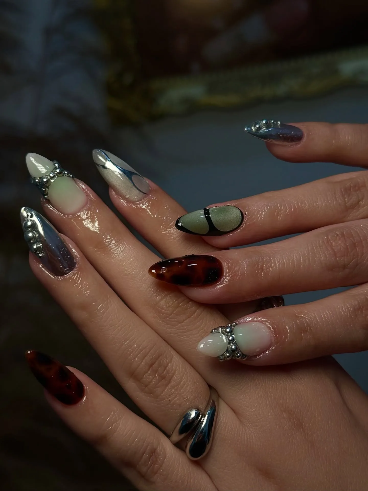 mixed chrome burgundy almond nails
