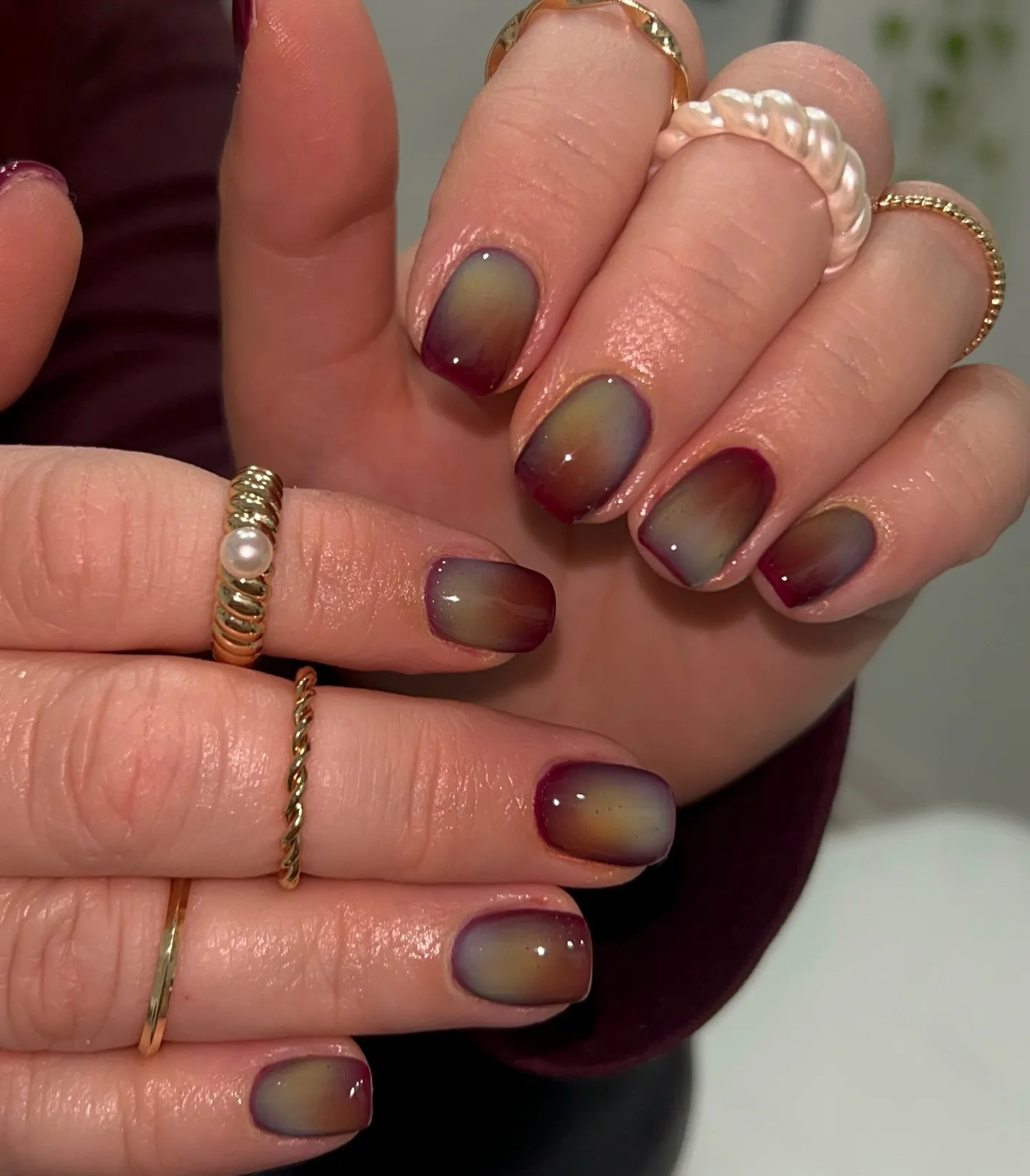 burgundy gold oval chrome nails