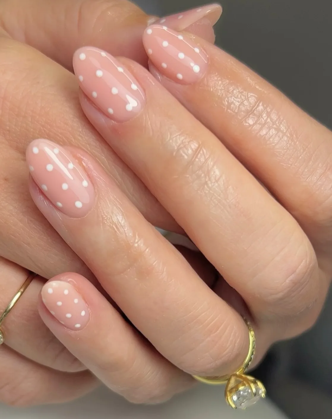 peachy pink oval polka dot nails