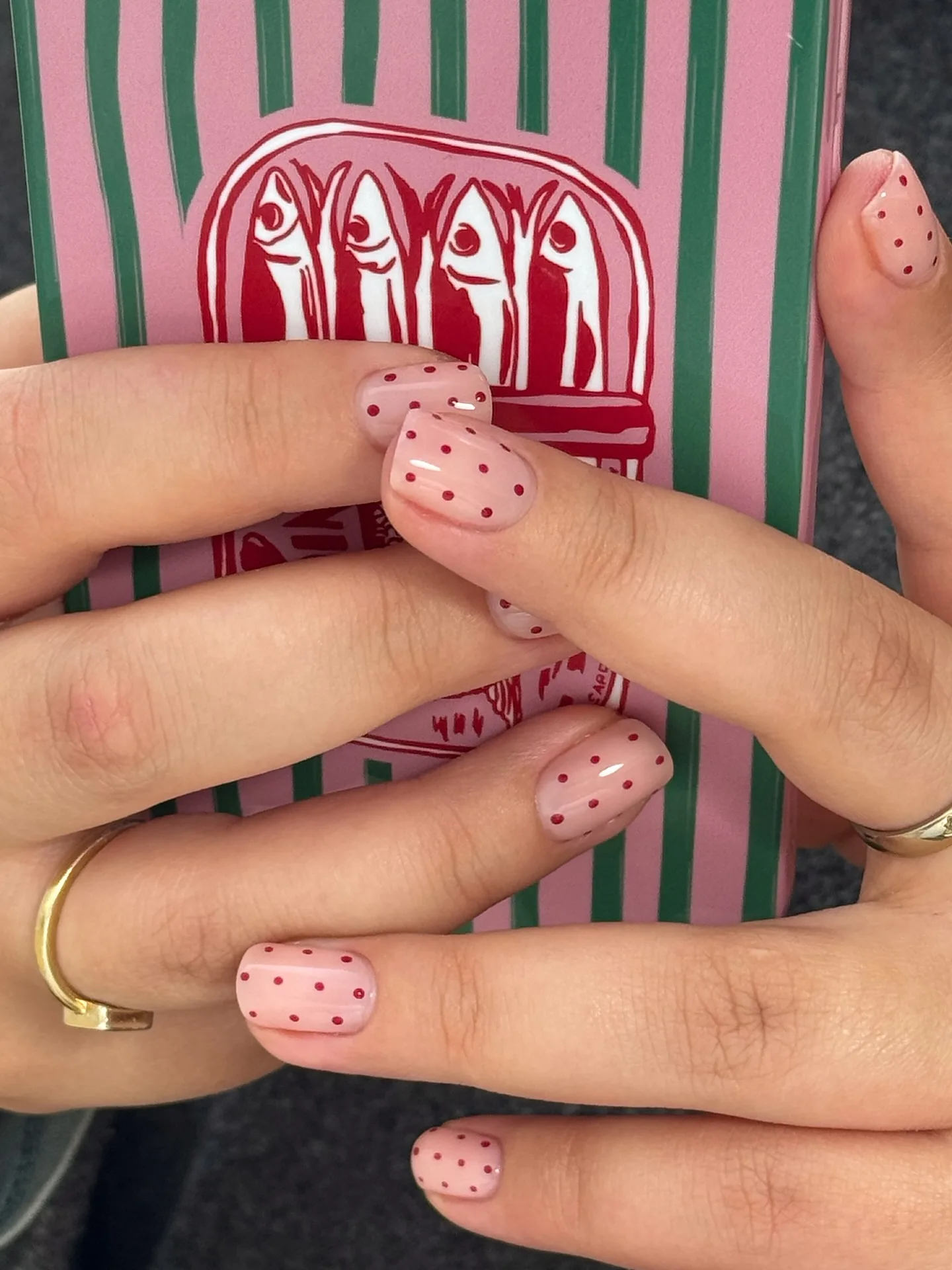 peachy pink rounded polka dot nails