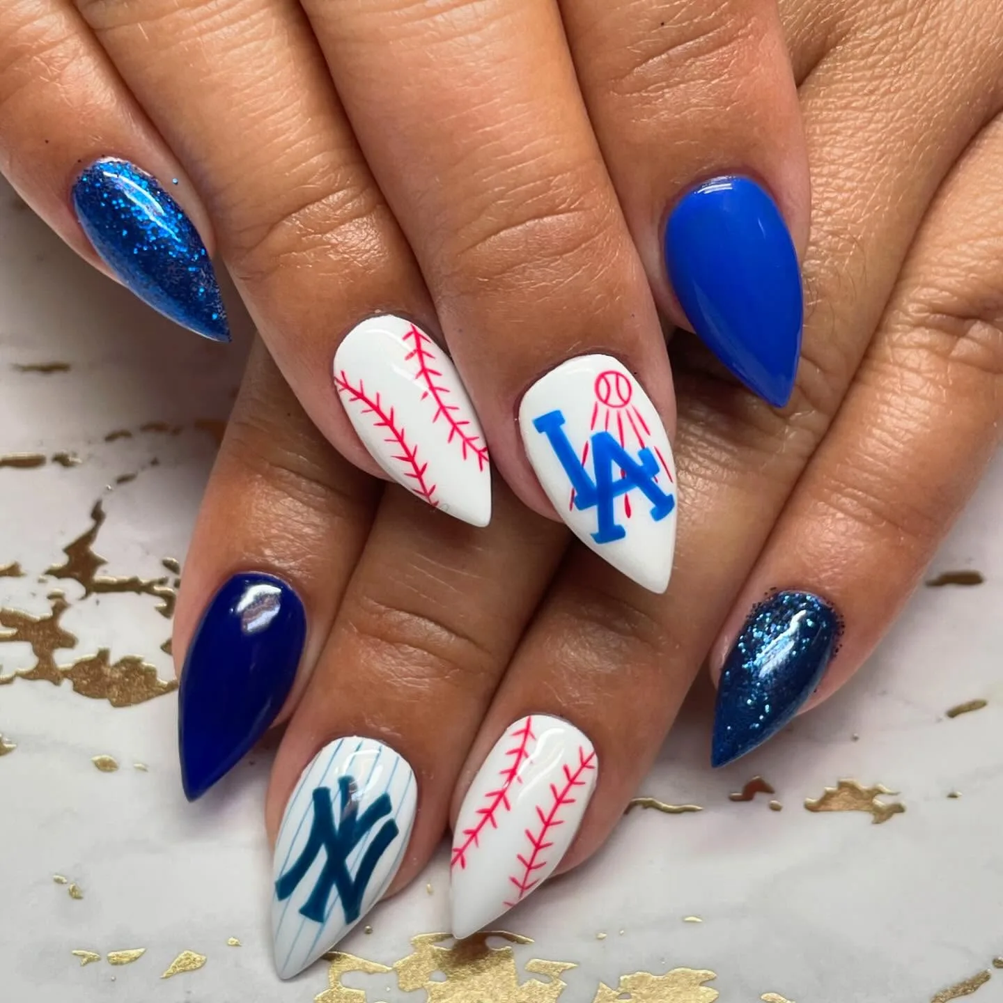 blue white stiletto baseball nails