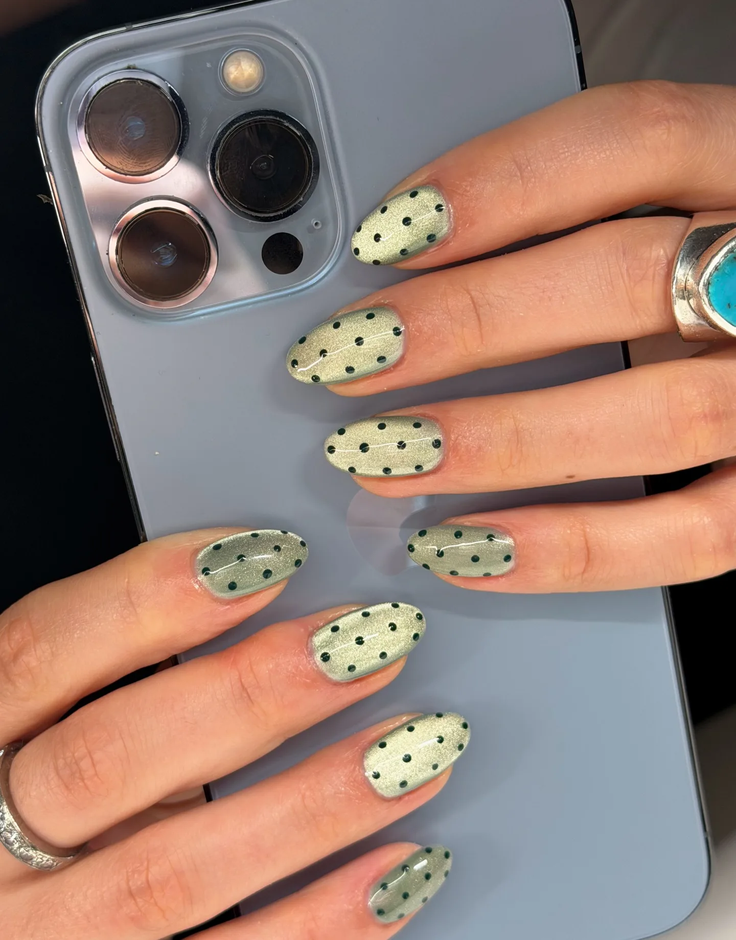 sage green oval shimmer polka nails