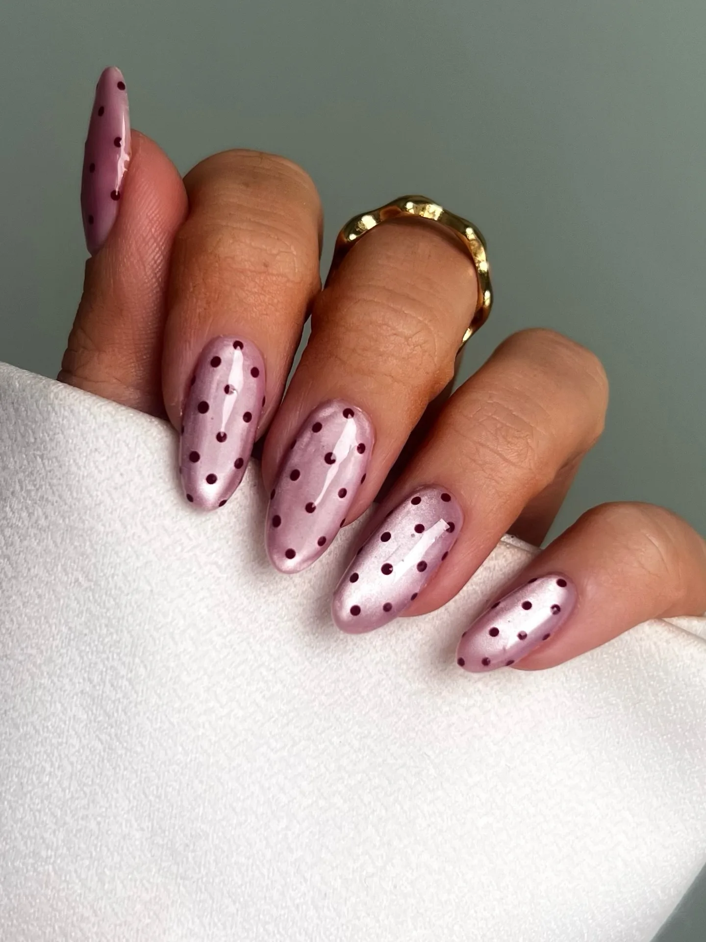 mauve oval polka dot nails