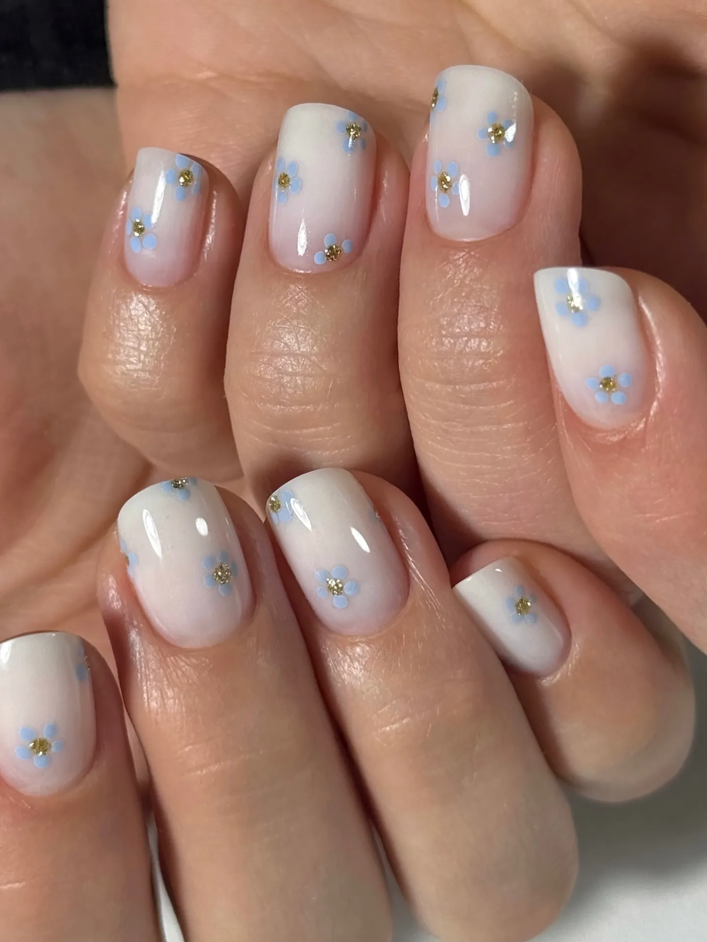 milky white oval daisy nails