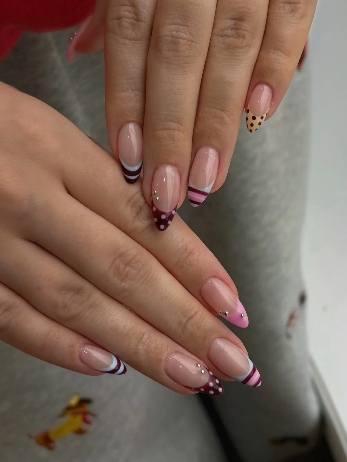 nude pink almond polka dot nails