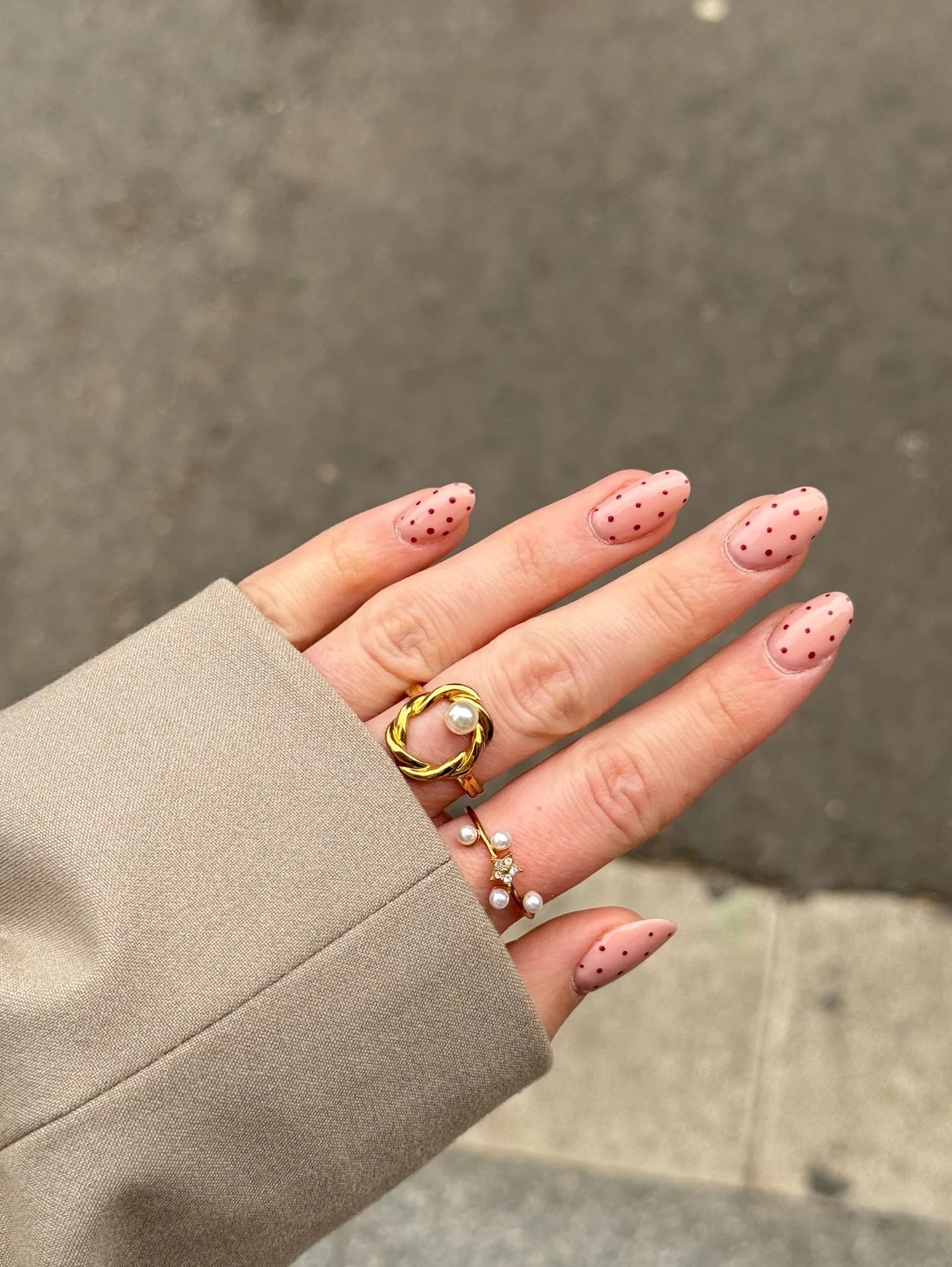 peachy pink oval polka dot nails