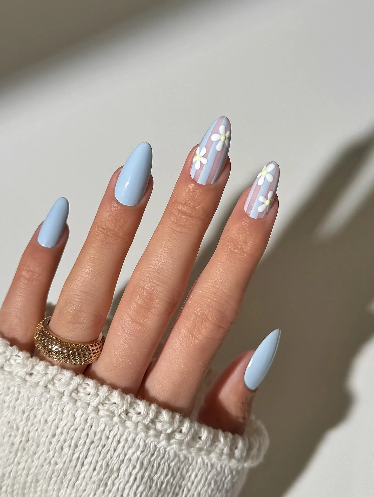 powder blue almond daisy nails