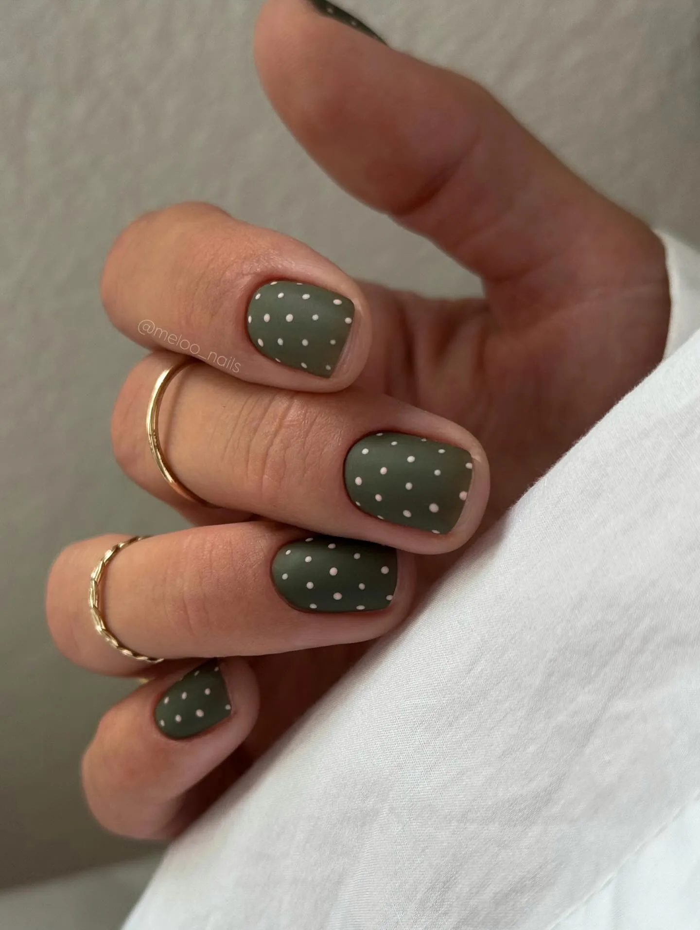 sage green rounded polka dot nails
