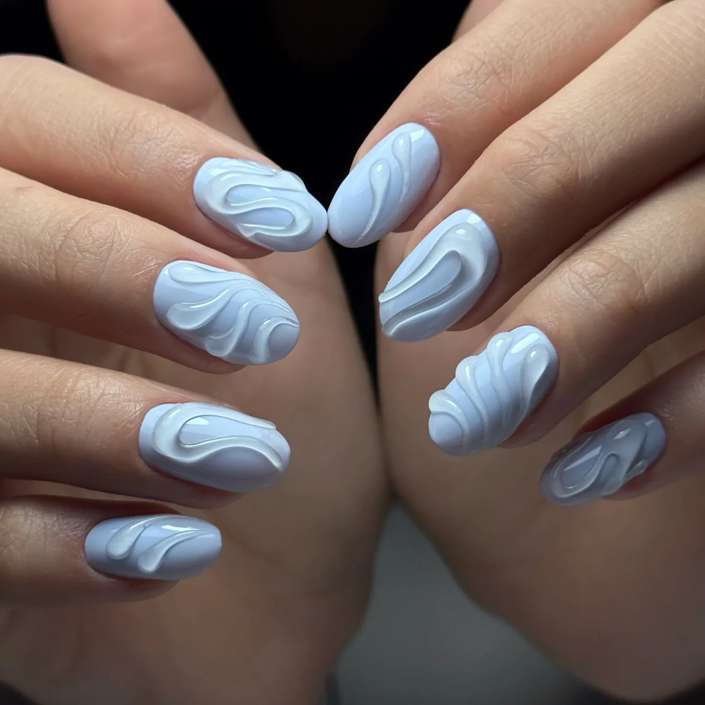 powder blue almond swirl nails