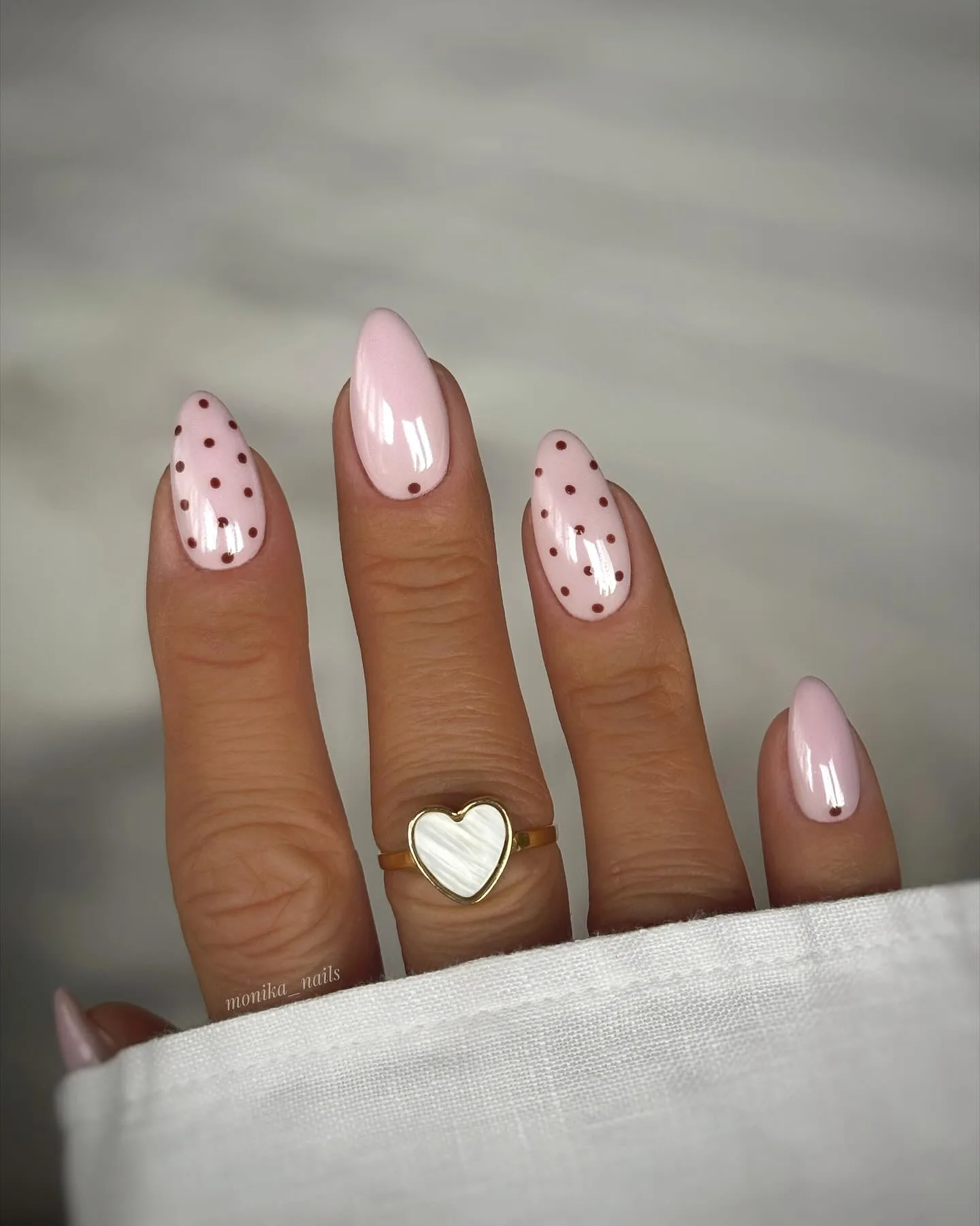 pink almond polka dot nails