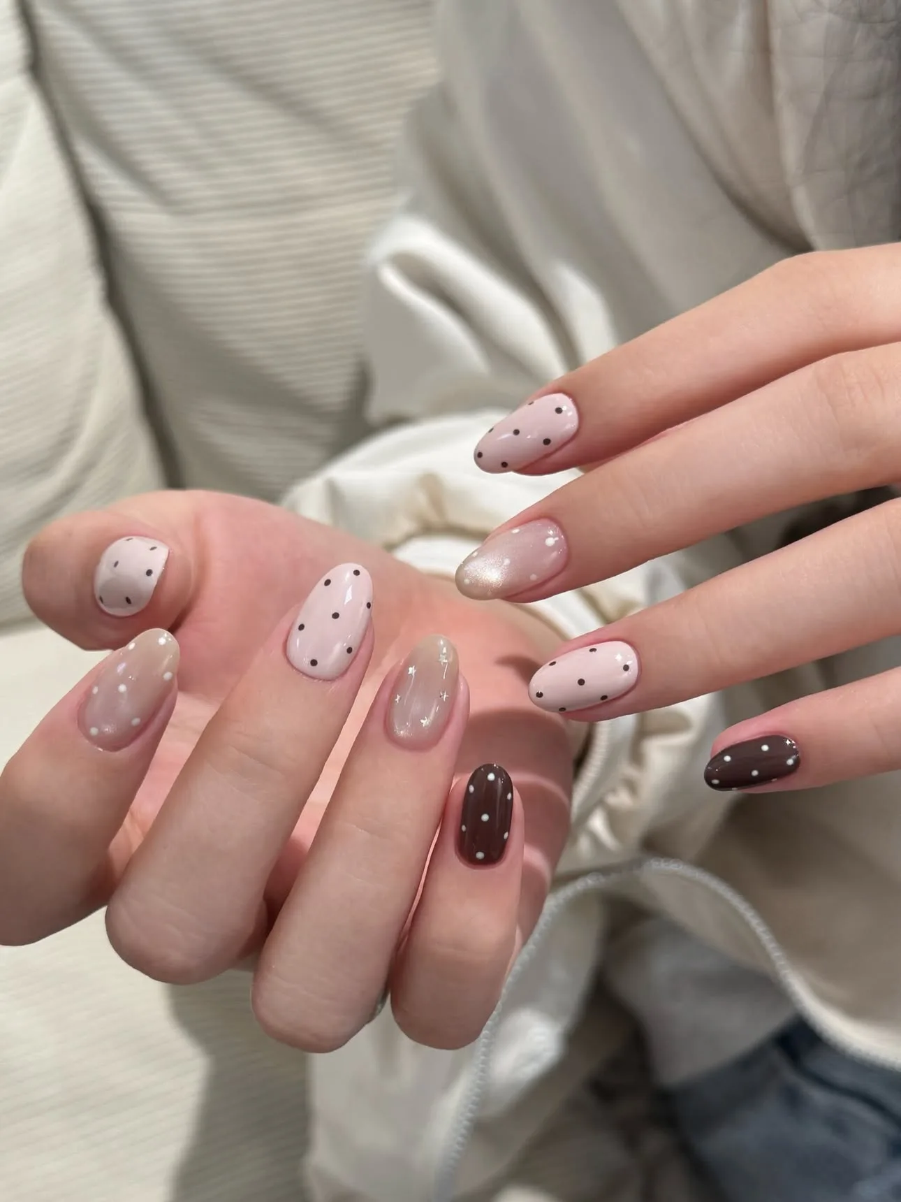 nude oval polka dot nails