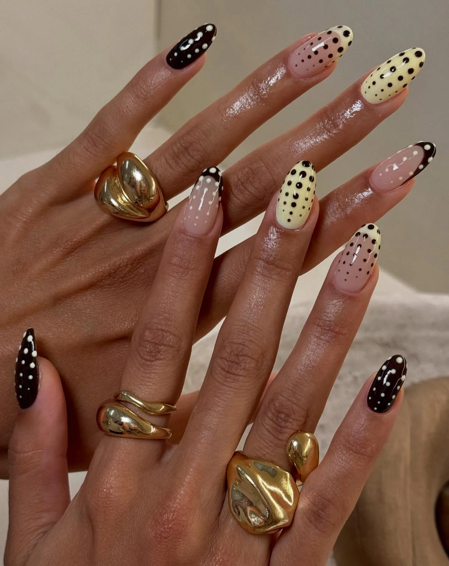 polka dot almond glossy nails