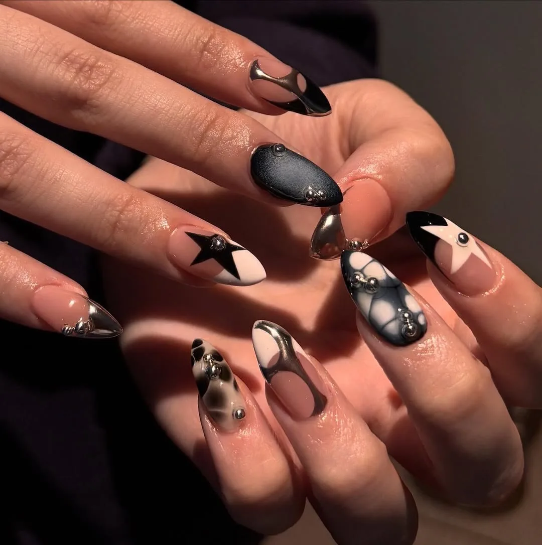 nude black almond studded nails