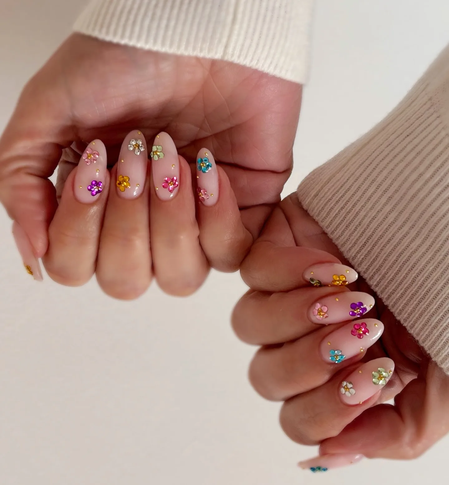 peachy nude almond rhinestone flower nails
