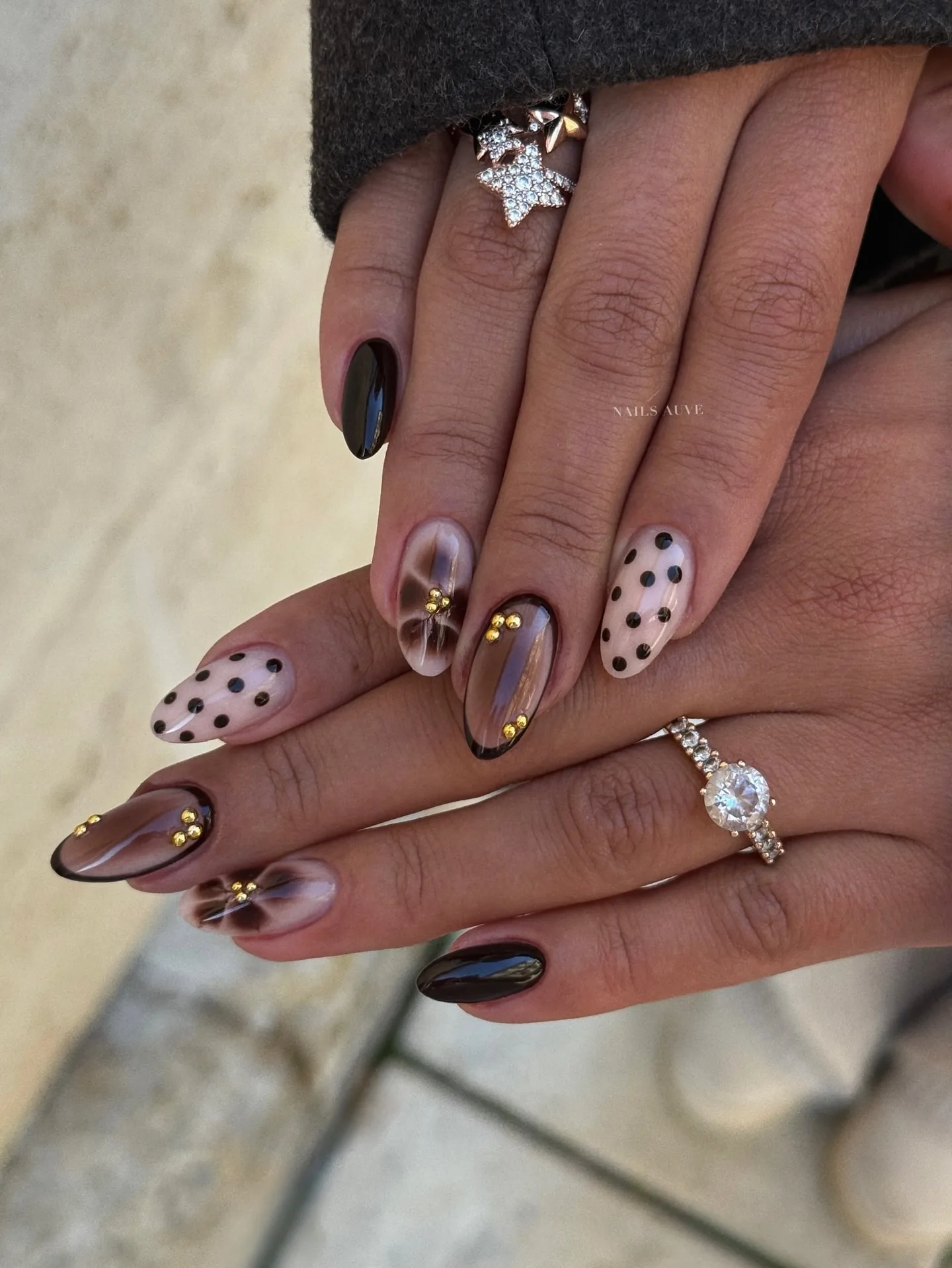 brown chrome almond dotted nails